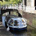 Canal boat near the Old Church - Daytrip: Delft Blue Line