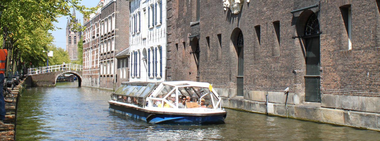 Boat through the canals of Delft