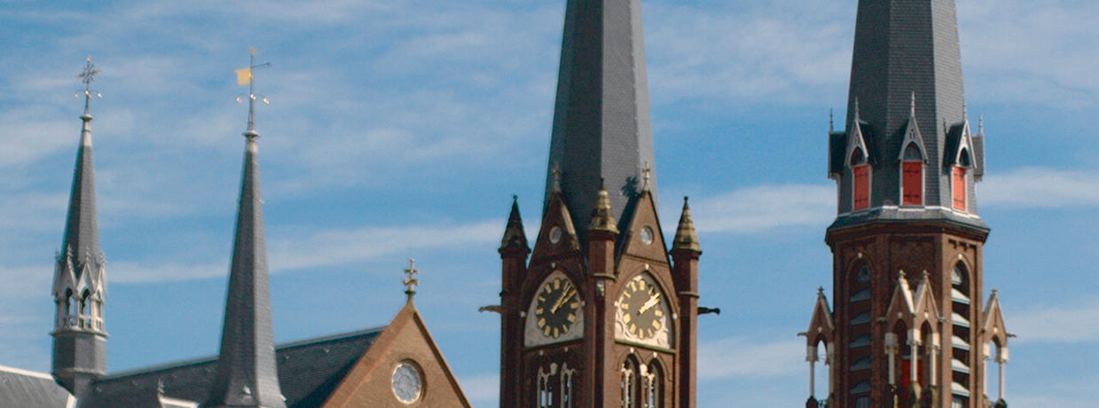 The two different towers of the Maria van Jesse Church