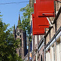 Zicht op de Oude Kerk in de volksmond De Oude Jan genoemd - Dagtocht: Wat dag je van Delft
