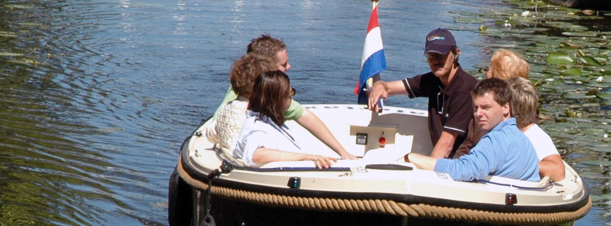 Met een fluisterboot door de grachten van Delft